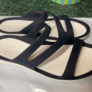 Navy and White Crocs Sandals
Size 8